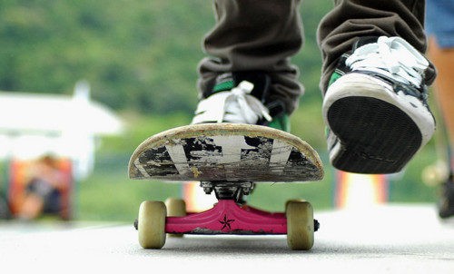 child riding a skateboard